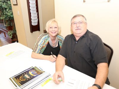 Debbie and Paul Walls volunteering as registrators