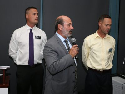 1995 Boys Volleyball Head Coach Lou Panzella with team members, Larry Lentz ll and Jonathan Tiernan