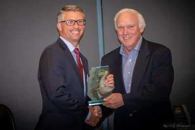 2018 Inductee Eric Johnson being presented his award by 2015 Inductee Steve Parks