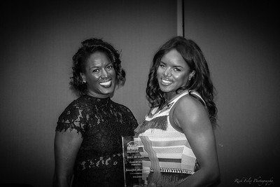 2016 Inductee Gabrielle Abernathy presenting to her sister, 2018 Inductee Jennifer Abernathy