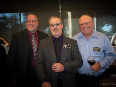 Enjoying Social Hour are Team Inductee 2016 Glenn Davis, 2016 Inductee Bill Dupree and 2009 Inductee Larry Hopwood