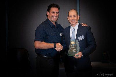 2010 Inductee Alex Sanchez presenting to 2018 Inductee Chris Munoz