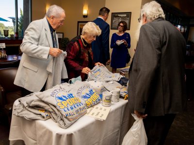 John and Barbara Harris at the Appreal Merchandise Table
