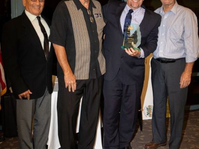 Tim Foote accepting his Hall of Fame award from Steve Sanchez HOF 2007 Butch The Big Righty Rounsaville HOF 2007 and Rally Rounsaville HOF 2007 All are also proud members of the Diablo Valley College Hall of Fame