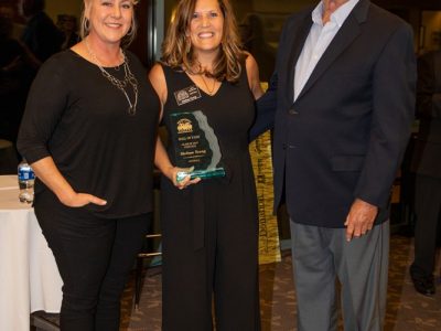 2016 Inductee Stephanie Andrews (Left) and 2014 Inductee John Rebstock presenting to 2019 Inductee Melissa Young her Hall of Fame award.