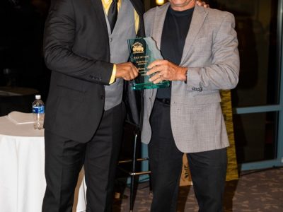2019 Hall of Fame Inductee Anthony Trucks being presented his award by 2009 HOF Inductee Jim Boccio Jr.
