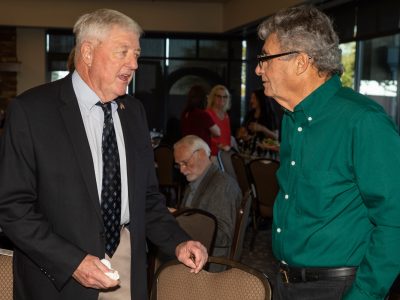 Tom Menaco's Sacremento State roomate Bob Douglass and Mr. Pico talking before the Gala.