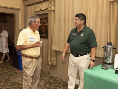 2023 Hall of Fane Class inductee Bob Olds chatting with Sports Legends Coordinator Louie Rocha